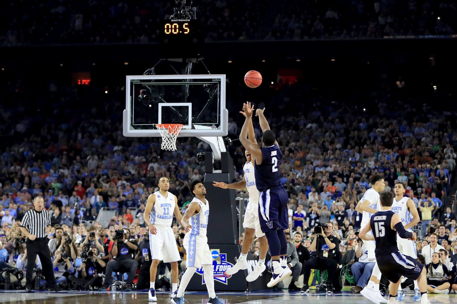 HOUSTON, TEXAS - APRIL 04:  Kris Jenkins #2 of the Villanova Wildcats shoots the game-winning three pointer to defeat the North Carolina Tar Heels 77-74 in the 2016 NCAA Men's Final Four National Championship game at NRG Stadium on April 4, 2016 in Houston, Texas.  (Photo by Ronald Martinez/Getty Images)