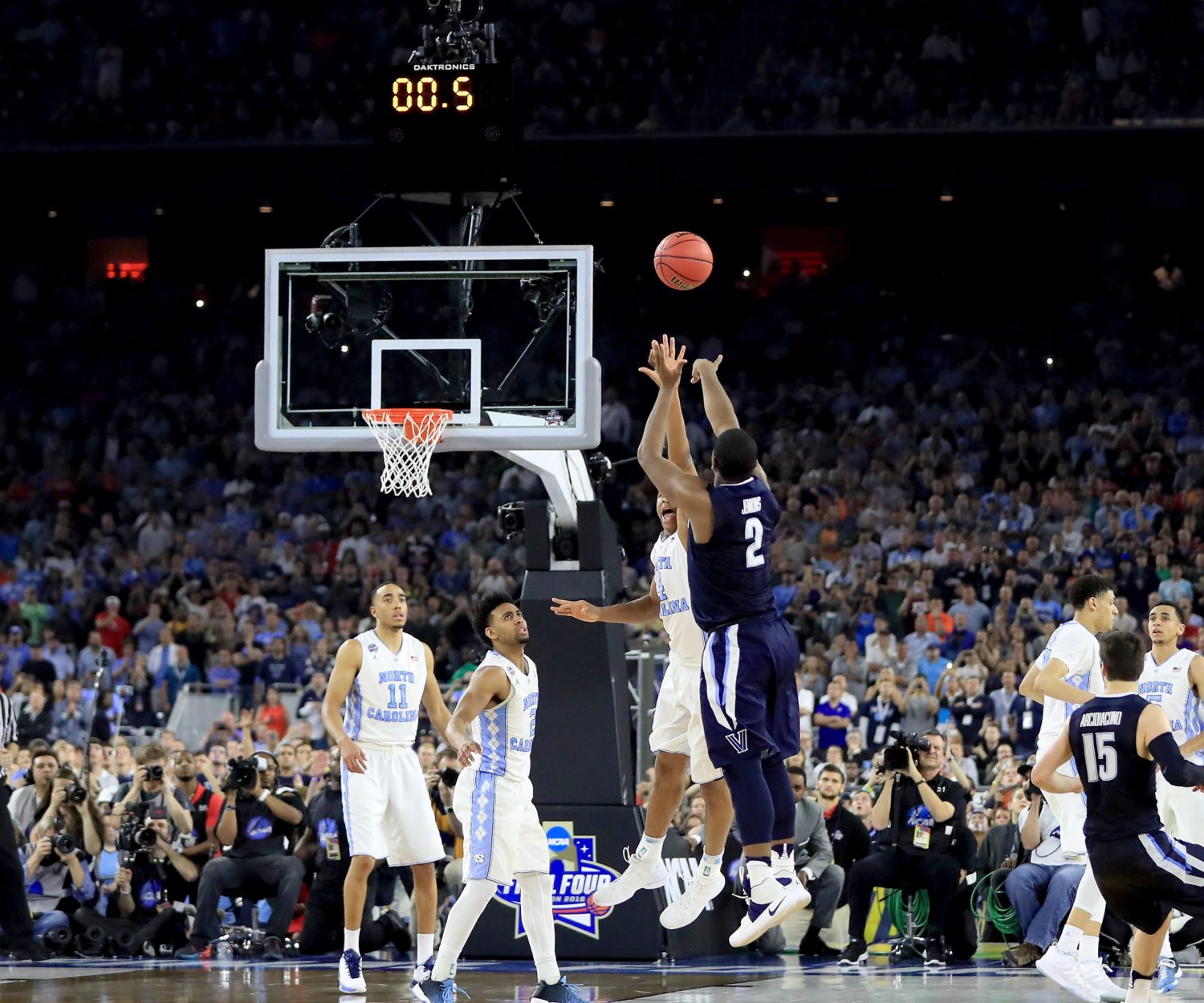 HOUSTON, TEXAS - APRIL 04:  Kris Jenkins #2 of the Villanova Wildcats shoots the game-winning three pointer to defeat the North Carolina Tar Heels 77-74 in the 2016 NCAA Men's Final Four National Championship game at NRG Stadium on April 4, 2016 in Houston, Texas.  (Photo by Ronald Martinez/Getty Images)