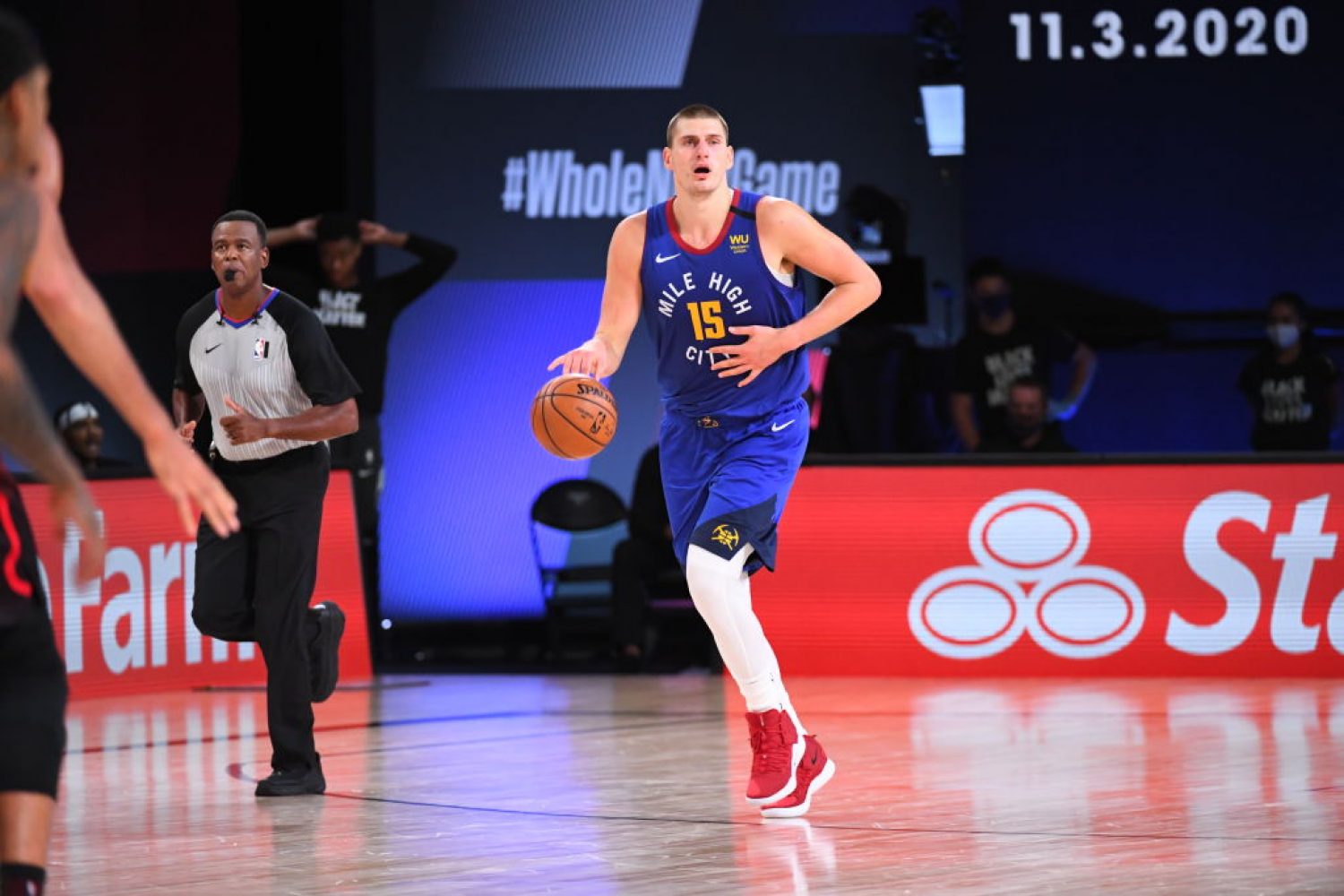 Orlando, FL - AUGUST 30: Nikola Jokic #15 of the Denver Nuggets handles the ball during the game against the Utah Jazz during Round One Game Six of the NBA Playoffs on August 30, 2020 at The AdventHealth Arena at ESPN Wide World Of Sports Complex in Orlando, Florida. NOTE TO USER: User expressly acknowledges and agrees that, by downloading and/or using this Photograph, user is consenting to the terms and conditions of the Getty Images License Agreement. Mandatory Copyright Notice: Copyright 2020 NBAE (Photo by Garrett Ellwood/NBAE via Getty Images)