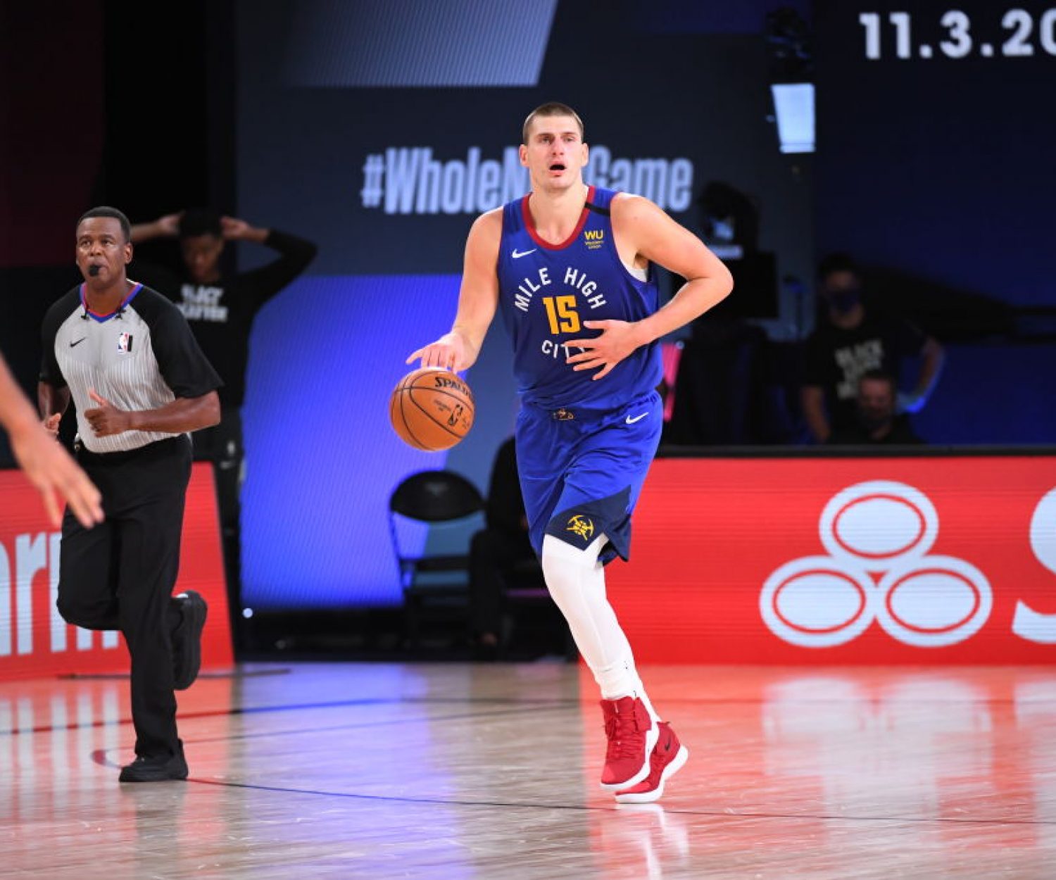 Orlando, FL - AUGUST 30: Nikola Jokic #15 of the Denver Nuggets handles the ball during the game against the Utah Jazz during Round One Game Six of the NBA Playoffs on August 30, 2020 at The AdventHealth Arena at ESPN Wide World Of Sports Complex in Orlando, Florida. NOTE TO USER: User expressly acknowledges and agrees that, by downloading and/or using this Photograph, user is consenting to the terms and conditions of the Getty Images License Agreement. Mandatory Copyright Notice: Copyright 2020 NBAE (Photo by Garrett Ellwood/NBAE via Getty Images)