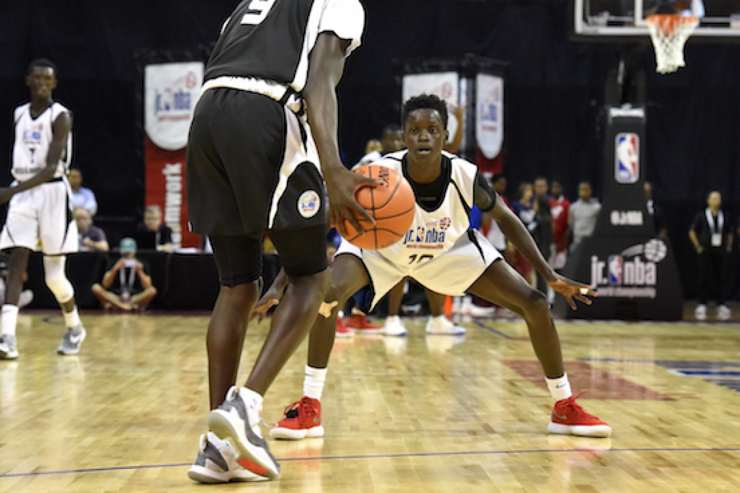 ORLANDO, FL - AUGUST 12:  Mozae Downing-Rivers #9 of Africa & Middle East Boys handles the ball against Mohamed Maiga #10 of Central Boys during the Jr. NBA World Championship Tournament in Orlando, Florida at ESPN Wide World of Sports Complex on August 12, 2018. NOTE TO USER: User expressly acknowledges and agrees that, by downloading and/or using this photograph, user is consenting to the terms and conditions of the Getty Images License Agreement. Mandatory Copyright Notice: Copyright 2018 NBAE (Photo by Gary Bassing/NBAE via Getty Images)