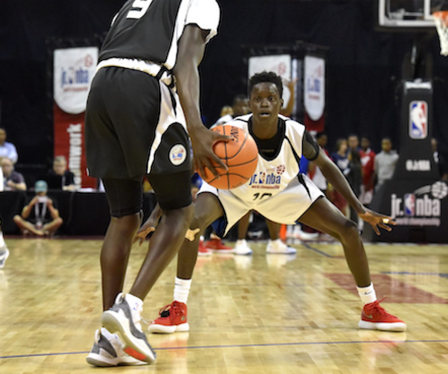ORLANDO, FL - AUGUST 12:  Mozae Downing-Rivers #9 of Africa & Middle East Boys handles the ball against Mohamed Maiga #10 of Central Boys during the Jr. NBA World Championship Tournament in Orlando, Florida at ESPN Wide World of Sports Complex on August 12, 2018. NOTE TO USER: User expressly acknowledges and agrees that, by downloading and/or using this photograph, user is consenting to the terms and conditions of the Getty Images License Agreement. Mandatory Copyright Notice: Copyright 2018 NBAE (Photo by Gary Bassing/NBAE via Getty Images)